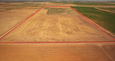 Birds eye view of property with a rural view