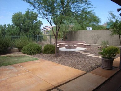 Backyard fire pit sitting area