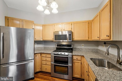 14324 Climbing Rose Way unit 102, Centreville, VA 20121 - photo 7