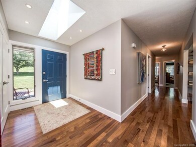 Light filled front entry with new sky light and do