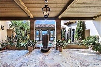 Private front courtyard with tranquil water founta