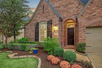 Closeup view of the impeccable landscaping adorning this beautiful home.