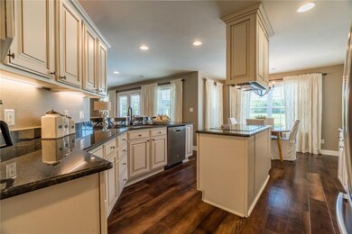 Kitchen and breakfast room open to the living and covered porch.