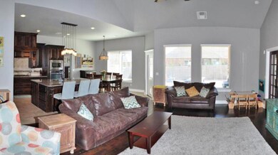 Living Room  Your living space boasts rich hardwoo