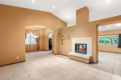 View of Formal Living Room, Two Way Fireplace, Din