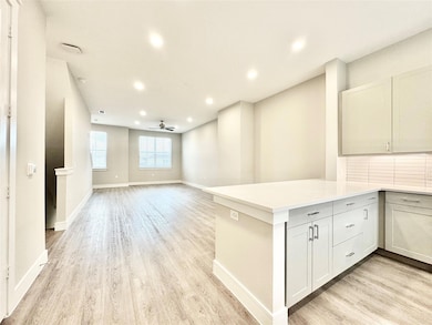 Kitchen featuring light hardwood / wood-style floo