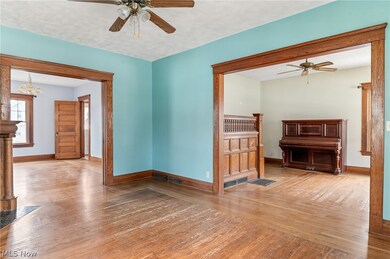 View from living room into dining room and parlor