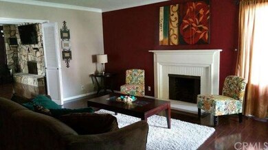 Living room with view of fireplace