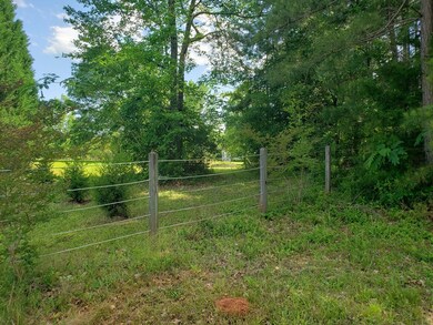 Property to the left has horses