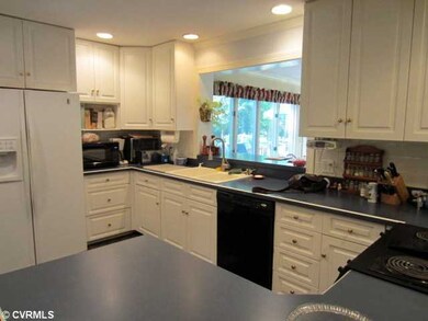 Kitchen - Eat-In Area to rear through Pass Through