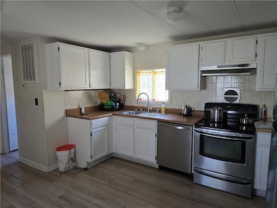 204 S Lyne Ave, Raymore, MO 64083 - photo 6