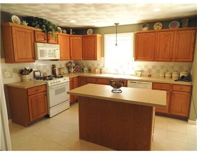 Kitchen. large open kitchen with laundry area  - a