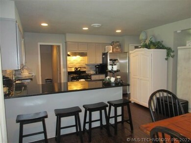 Granite Bar In Open Kitchen