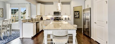 Beautiful Kitchen with Large Gourmet Island that can Seat Up to 5 and has Cabinets for Storage on Both Sides