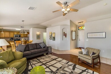 Open view of living room and kitchen