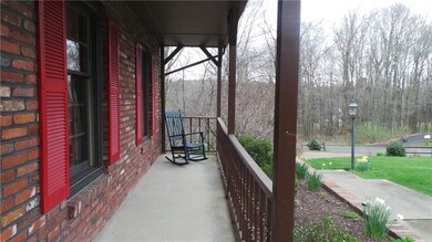 Relax on the front porch and enjoy the well landsc