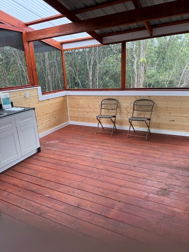 EXPANSIVE LANAI FOR ENTERTAINING AND STORAGE!