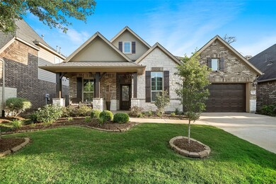 This 4 bedroom 3 1/2 bath home is loaded with upgrades.