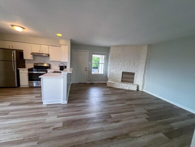 Kitchen with a sink, stainless steel appliances, 