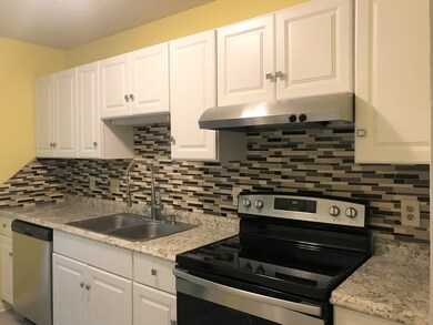 New kitchen with stainless steel appliances