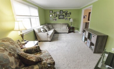 Natural light brightens the spacious living room.