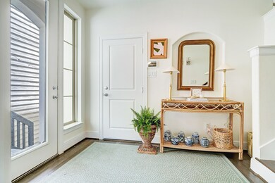 Formal entry with door to oversized, 2-car garage.