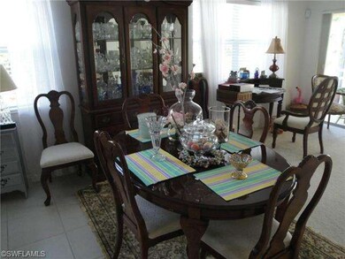 Large dining area with tile floors.