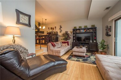 The spacious living area has patio access and is o
