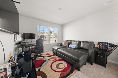 Carpeted office with baseboards