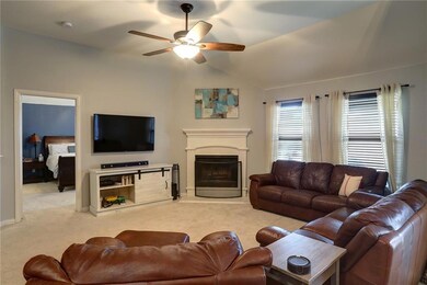 High ceilings and gas fireplace in the living room