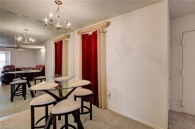 Dining area has full length mirrors