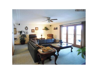 The large glass door in the Living Room opens onto