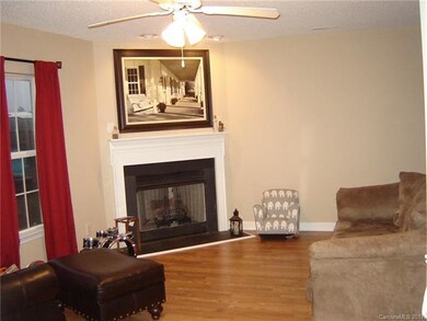 Spacious great room with gas log fireplace.