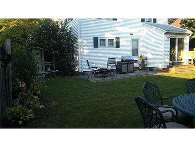 Exterior Back. Large yard for having summer cook-o