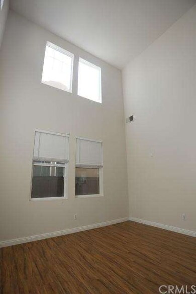 High ceiling entrance, living room