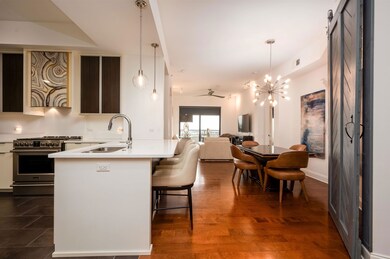 Kitchen with light countertops, high end stove, a 