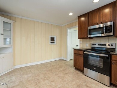 Kitchen has build in corner cupboard!