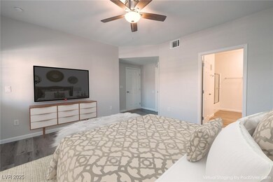 Bedroom with visible vents, ceiling fan, baseboard