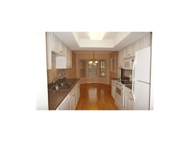 Kitchen w/newer bay window...