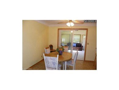 Dining area w/ slider to sunroom