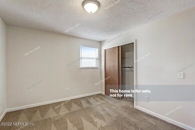 6879 Snow White Dr, Jacksonville, FL 32210 - photo 7