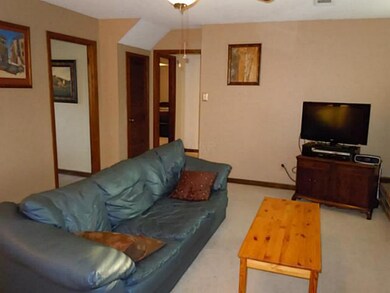 Another view of this spacious den/great room.