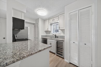 Granite Countertops kitchen, dishwasher, and wine