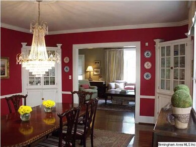 Dining room flows to both living area and kitchen;