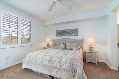 Bedroom featuring carpet floors and ceiling fan