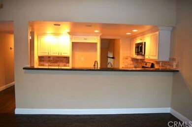 View from family room into kitchen.