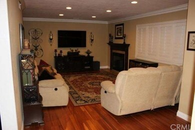 Spacious Living Room with Canned Lighting, Crown M