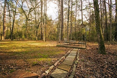 Spacious yard backed up to the woods.