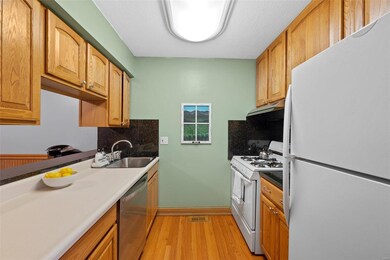 They maximized the cabinet storage in this small y