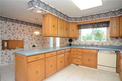 The kitchen offers plenty of counter space and two